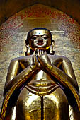 Ananda temple Bagan, Myanmar. The 9-meter-high images of standing Buddha. 